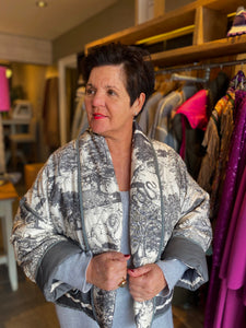 Doorstikte vest met print/ ODETTE