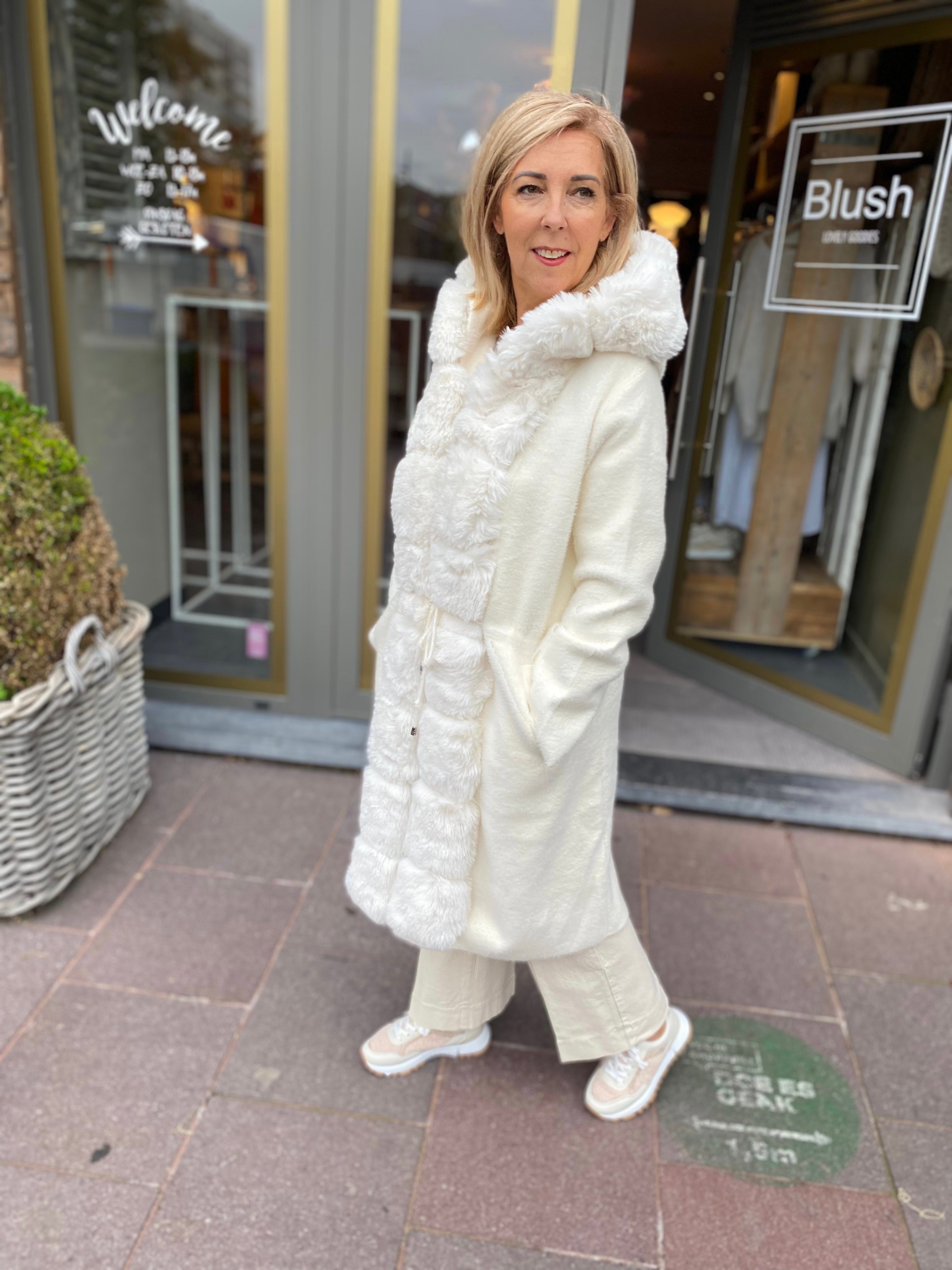 VEST MET AFNEEMBARE FAKE FUR BAND